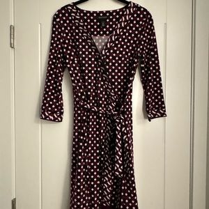 Black, white, purple, and red geometric White House Black Market wrap dress